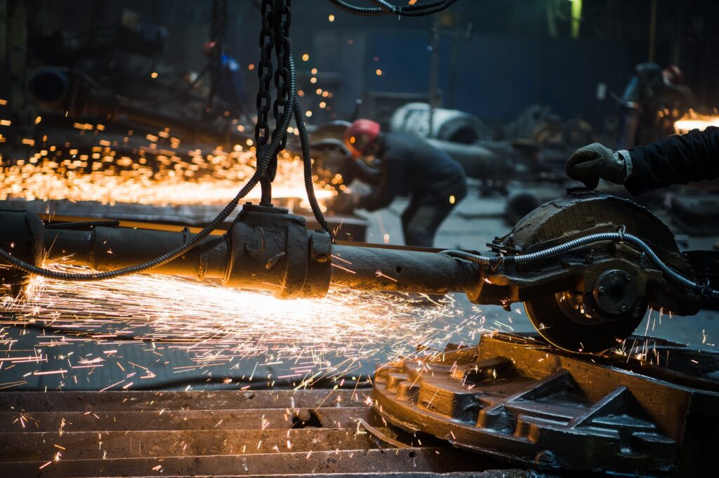 industrial-worker-cutting-and-welding-metal-with-many-sharp-sparks.jpg